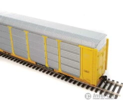Walthers Life-Like HO 101418 89' Thrall Enclosed Tri-Level Auto Carrier - Ready To Run -- Chicago & North Western(TM) ETTX Flat #701581 (yellow, Silver) -Walthers Sales walthers life like ho 101418 89 thrall enclosed tri level auto carrier ready to run chicago north western tm ettx flat 701581 yellow silver freight cars 608