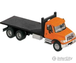 Walthers SceneMaster 11651 International(R) 7600 3-Axle Flatbed Truck - Assembled -- Orange Cab, Black Flatbed