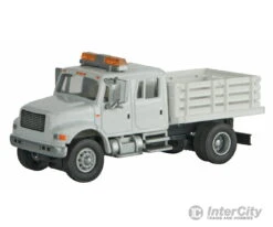Walthers SceneMaster 11894 International(R) 4900 Open Stake Bed Utility Truck - Assembled -- White W/Railroad Maintenance-of-Way Logo Decals